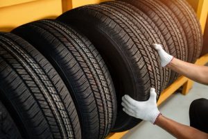 CloseToTheHandsOfATireChangerInLarge - Meineke Car Care - Texas Meineke Car Care | Tire Replacement | Dallas